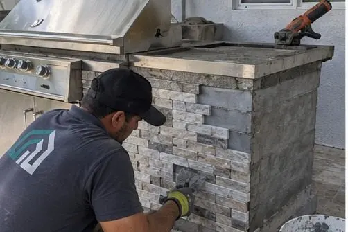 Hollywood Outdoor mason building an outdoor kitchen base